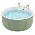 Bañera exenta redonda 150 x 60 cm de acrílico verde y blanca con grifería dorada